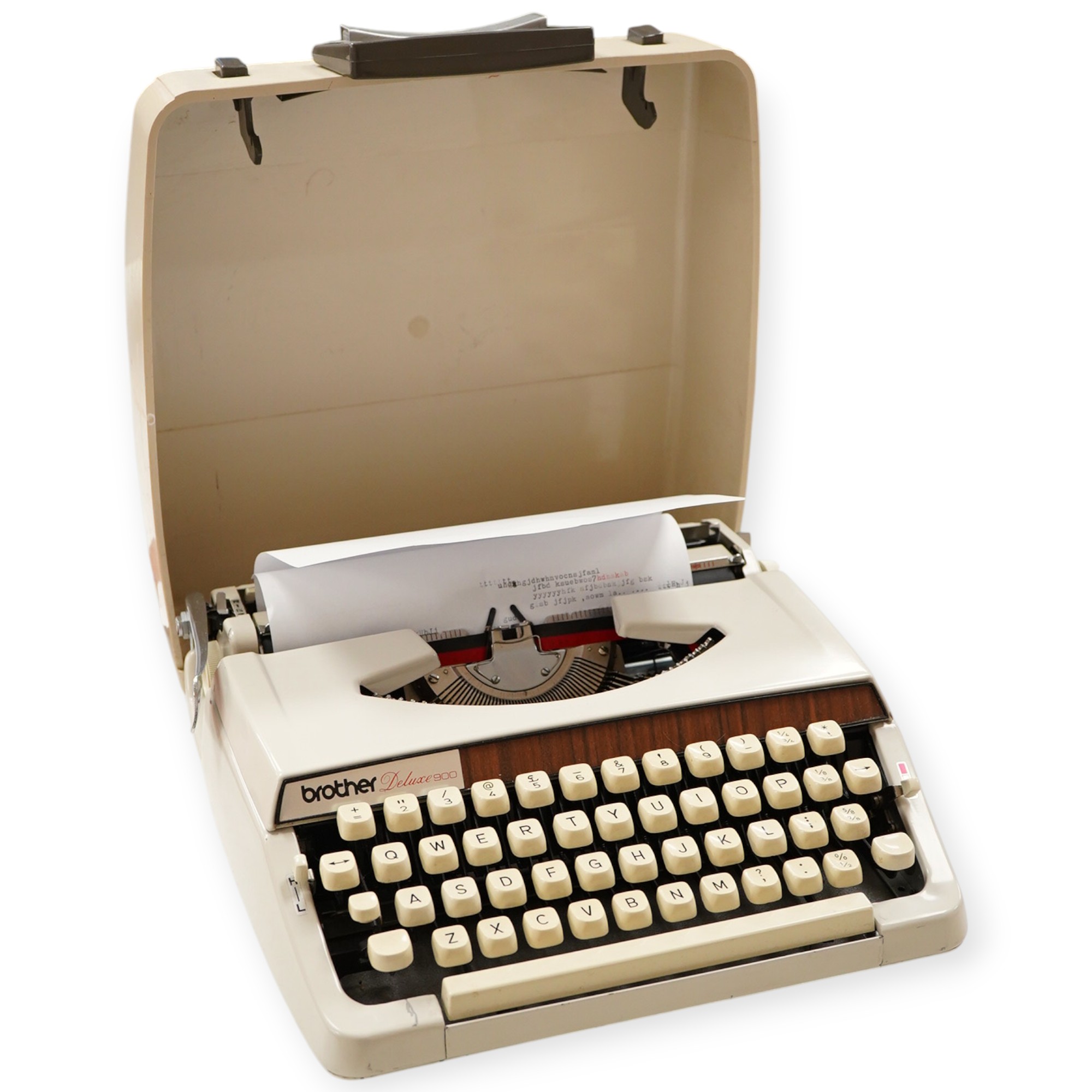 A 1970’s Brother Deluxe 900 working portable typewriter, 30cm x 30cm
